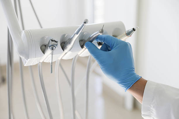 Professional Tooth Extraction technician working in Ludowici, GA